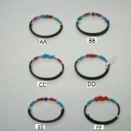 Bracciale in caucciu’ corallo e turchese