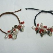 Bracciale cordino con perle , conchiglie e corallo