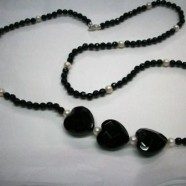 Collana con pallini e cuori in agata nera