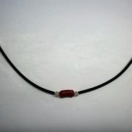 Bracciale in caucciu’ e cannetta corallo