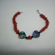 Bracciale in corallo con cuori murrina