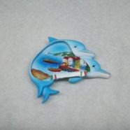 Magnete delfino con barca